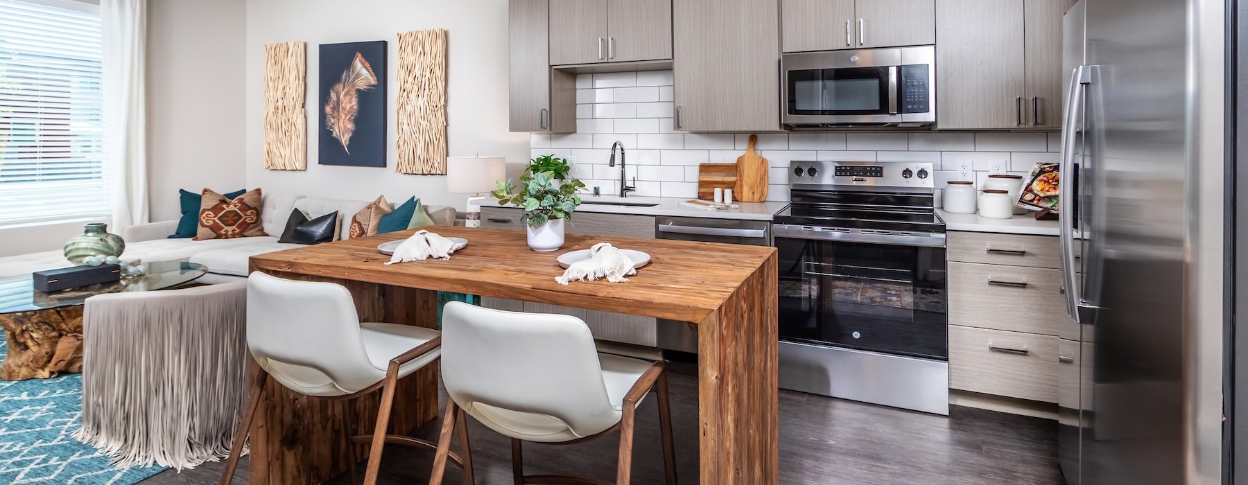 a kitchen with a table and chairs