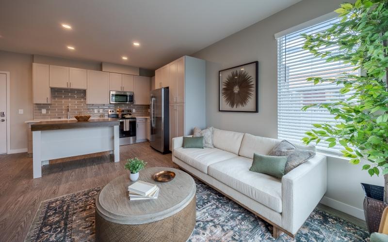 a living room with a couch and a table