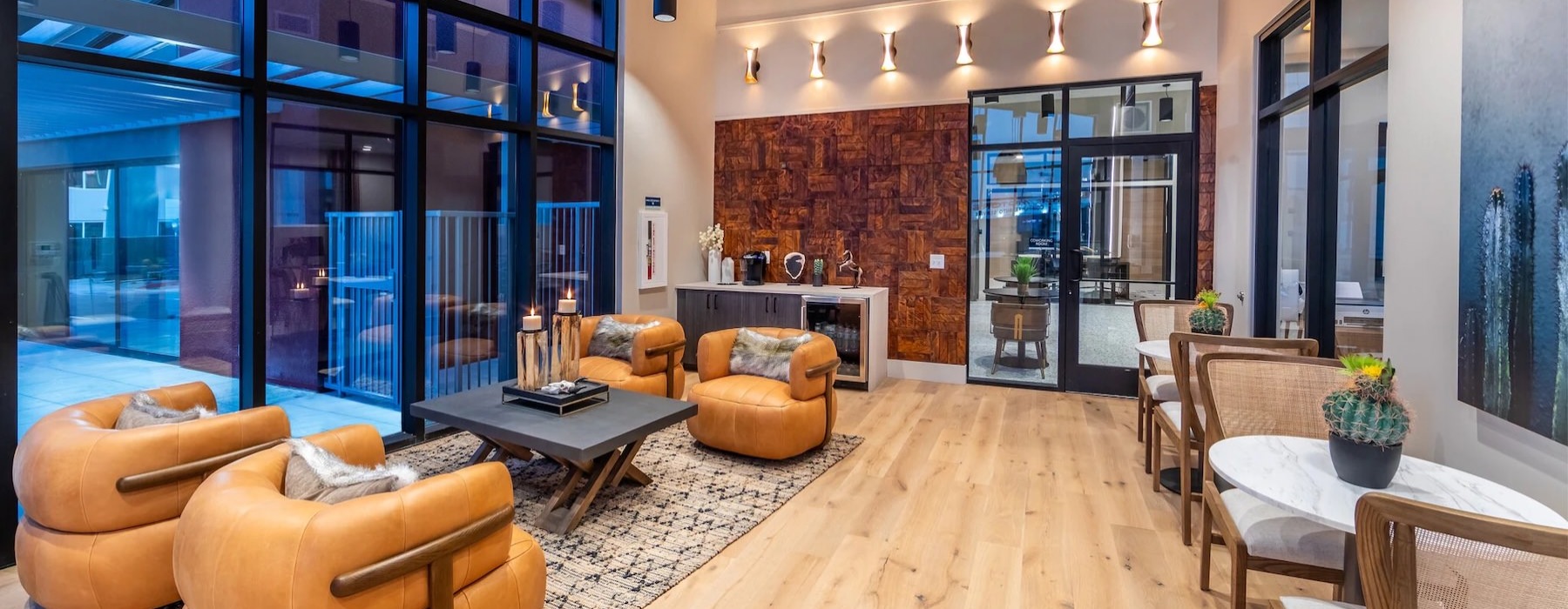 a clubroom with chairs and a coffee table