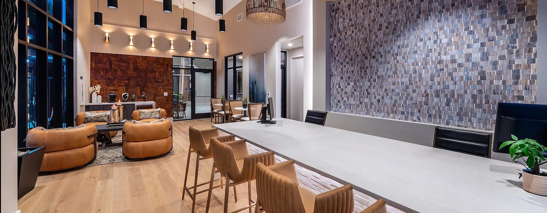 a clubroom with a table and chairs