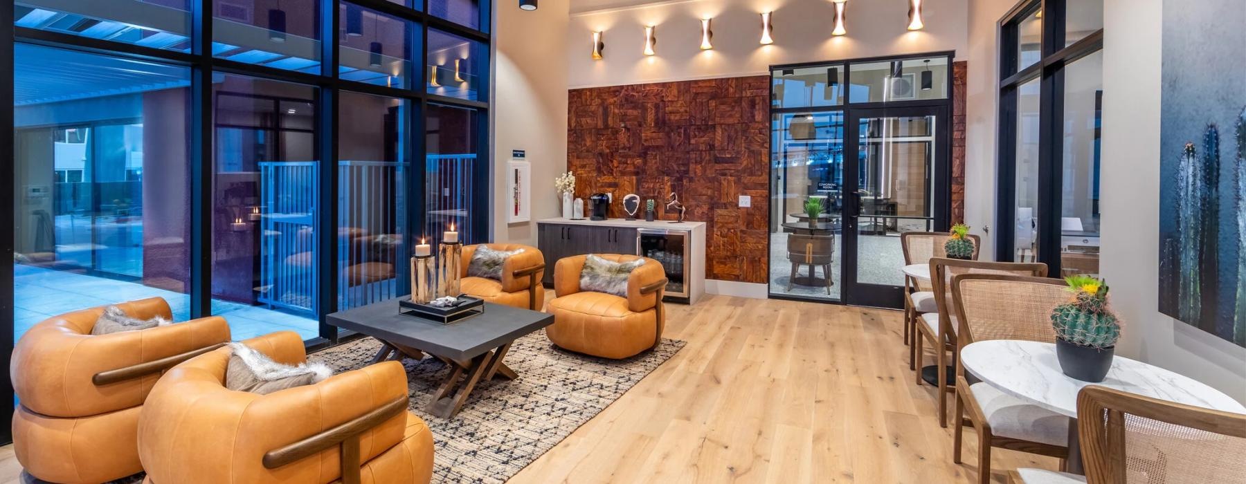 a club room with chairs and a coffee table